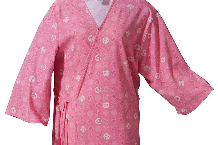 A pink Healing Spaces patient robe.
