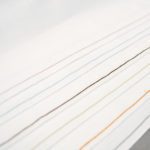 A detail shot showing a variety of color coded EZ ID threads.
