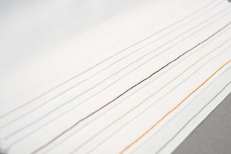 A detail shot showing a variety of color coded EZ ID threads.