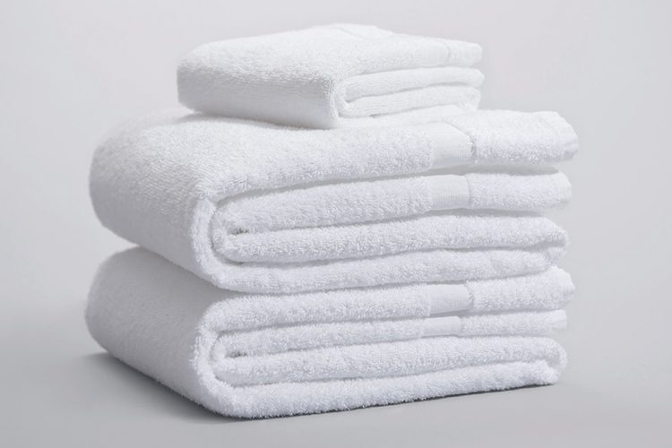 A stack of folded Room Ready towels.