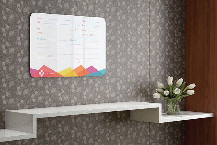 A Clarus Glass Board on the wall of a Healthcare facility.