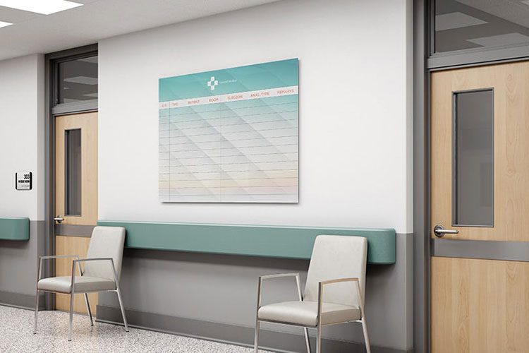 Image is of a large Clarus Board in a hospital corridor.