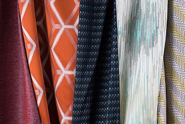 A variety of fabrics featuring vibrant and stylish patterns and colors.