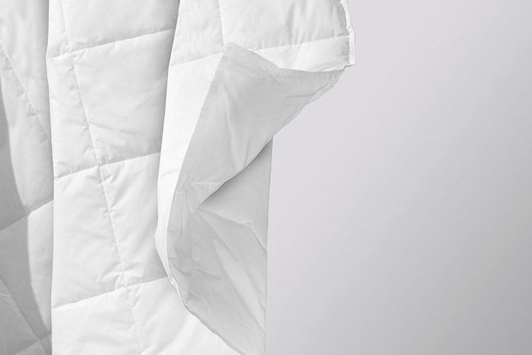 A close up shot of an AirLux blanket for hotels.