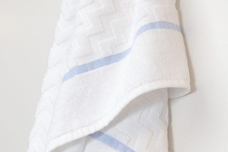A close up image of a EuroSpa Luxury Pool Towel available in bulk