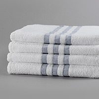 stacked of four white and blue striped towels