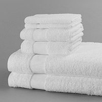 stack of white eurosoft towels in assorted sizes