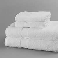 stack of white prelaundered towels