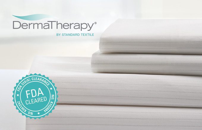 stack of striped dermatherapy linens