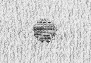 Example of chemical damage on a Standard Textile Towel with Centium Core