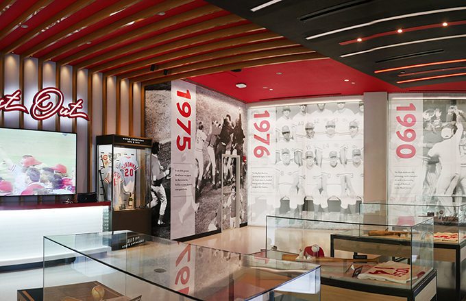 Interiors photo of Reds Hall of Fame including graphic roller solar shades by Standard Textile