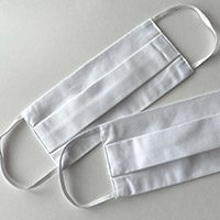 white cotton face mask with elastic band