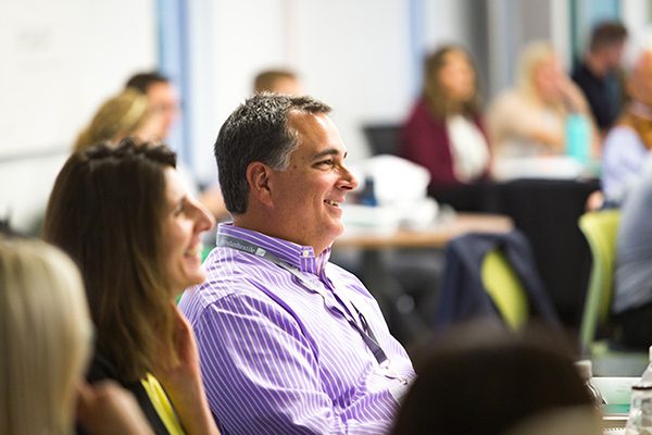 Standard Textile associates engaging in a meeting at the headquarters in Cincinnati, Ohio.