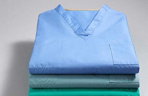 folded stack of medical scrubs