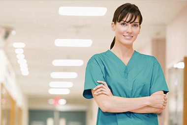 medical professional wearing scrubs in a healthcare facility