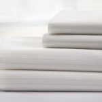 Stack of DermaTherapy sheets and pillowcases