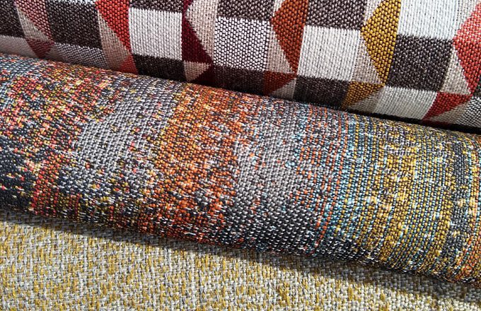 Three fabric patterns with neutral shades.