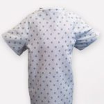 A floating image of patient gown. Standard Textile offers hospital gowns in a variety of sizes and patterns. Custom patient gowns are also available.