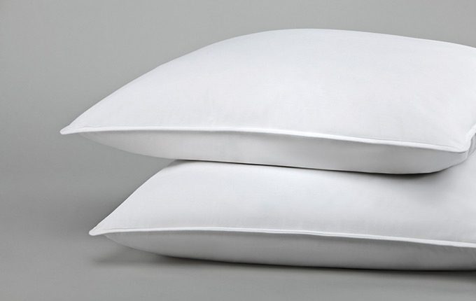 stack of two white hotel pillows