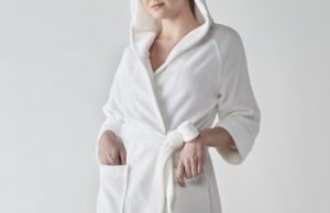 female model wearing luxury hotel robe by Heidi Weisel