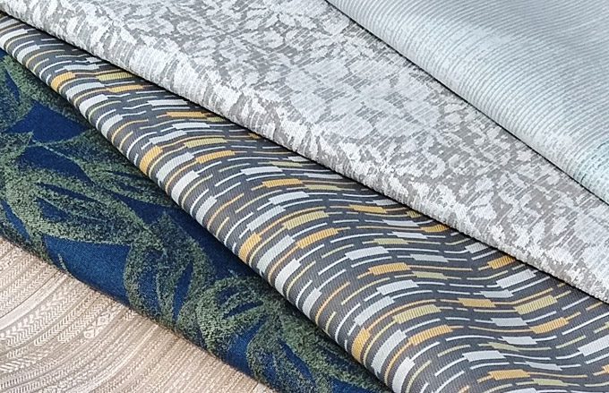 Image of a diverse range of fabrics available to be see on our fabric gallery.