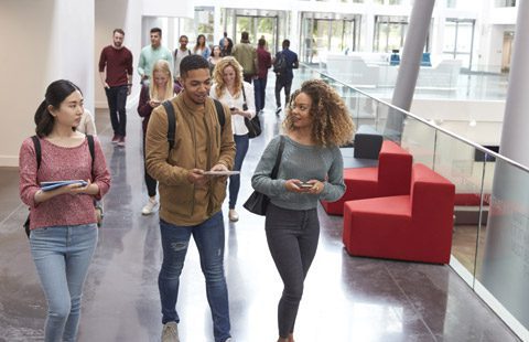 students walking in a hallway