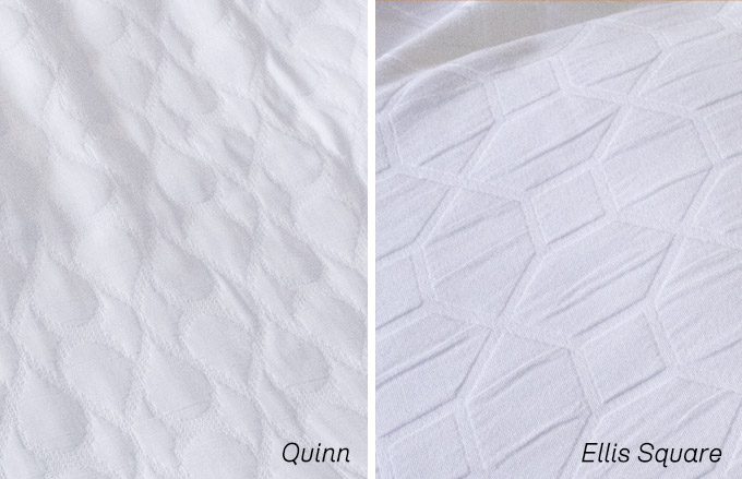 Detail of two white on white top covers. The Quinn features a geometric pattern in matelassé construction. The Ellis Square top cover is a lattice pattern top cover with puckered construction.