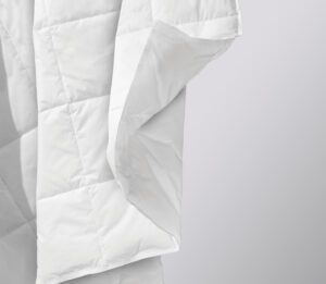 The AirLux lightweight duvet is a down alternative. Photo makes the insert appear to be floating.