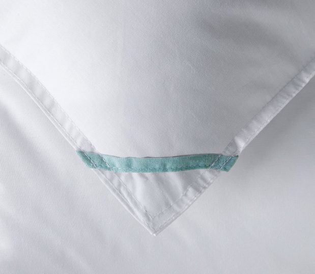 Detail of the Elevation duvet invert. These durable comforters are 100% Recycled Down Alternative.