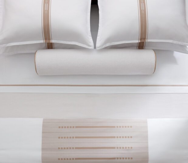 Image of an elegant bed featuring the Concerto Duvet Cover.