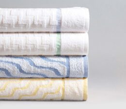 A stack of our 4 unique EuroSpa pool towel designs.