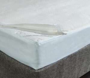 Corner detail of AllerEase Mattress Encasement on a bed.