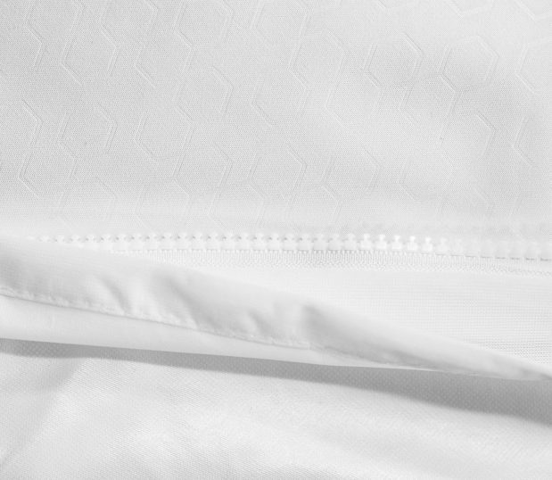 Detail of zipper for AllerEase Gold Mattress Encasement. This mattress encasement protects against bed bugs, dust mites, allergens, spills, and microbes.
