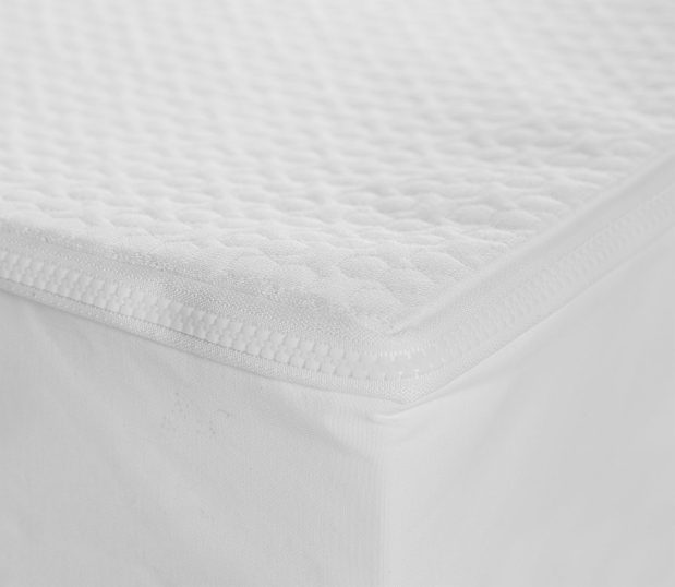Corner detail of AllerEase Platinum Mattress Encasement. This mattress encasement protects against bed bugs, dust mites, allergens, spills, and microbes.