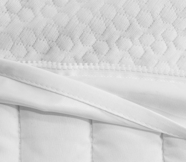 Detail of zipper for AllerEase Platinum Mattress Encasement. This mattress encasement protects against bed bugs, dust mites, allergens, spills, and microbes.