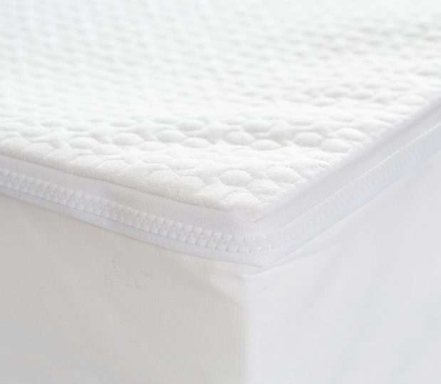 Corner detail of AllerEase Platinum Plus Mattress Encasement. This mattress encasement protects against bed bugs, dust mites, allergens, spills, and microbes.