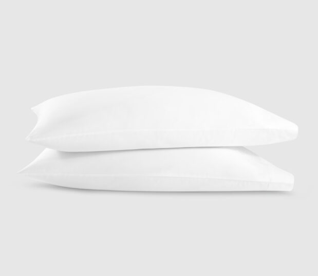 Two Paragon Pilowcases are shown here on pillows and stacked on top of each other.