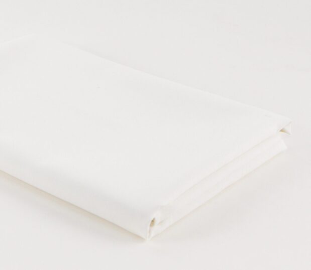A detail shot of a white professional tablecloth.