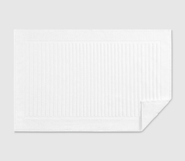 The plush Luxury Stripe Bath Mat features ultra-plush cotton but remains lightweight and quick drying.
