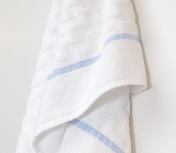A hanging shot of our EuroSpa StairStep Blue towel