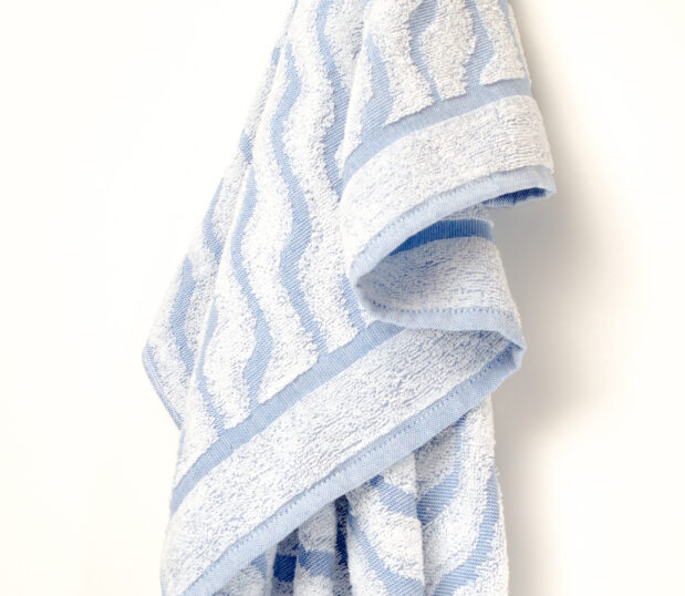 A hanging shot of our EuroSpa Wave Blue towel