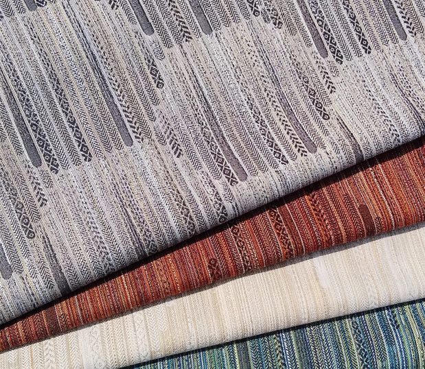 4 of the colorways for the Crypton Bellatrix fabric line are artfully fanned out.