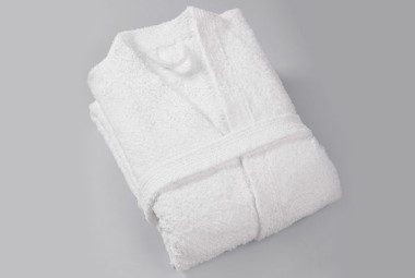 A folded cotton robe is shown against a grey background.