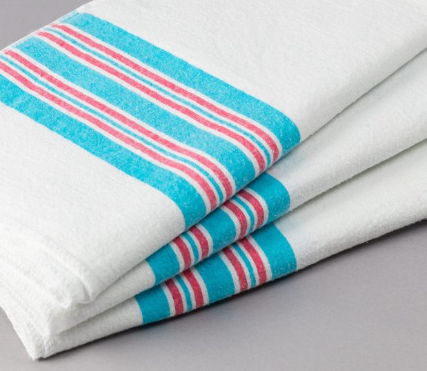 Stack of three of our Striped Baby Blankets. These baby blankets feature classic pink and blue stripes.