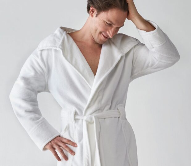 This is a photo of a male model wearing a Heidi Weisel Bailey Bathrobe.