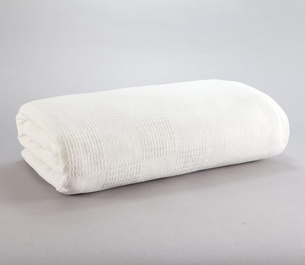 Shown here is a folded 100% Cotton Thermal Blanket with a Checkerboard Pattern.