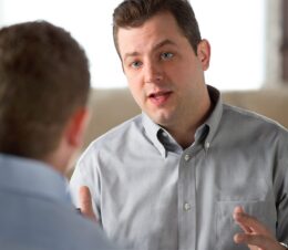 Image shows a Consultative Services expert helping a customer.