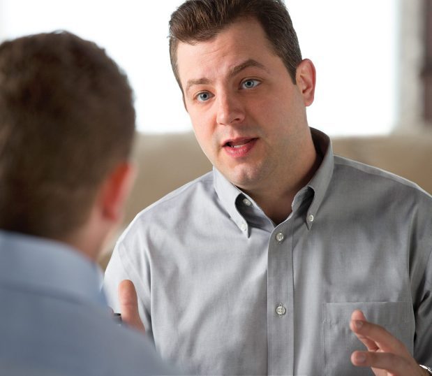 Image shows a Consultative Services expert helping a customer.