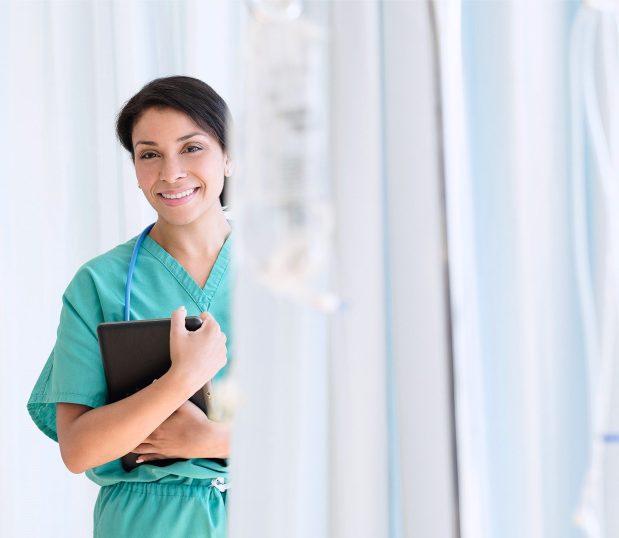 Image shows a nurse smiling with an ipad in a hospital setting. A solution to simplify cubicle curtain management, CubeControl® Cubicle Curtain Tracking Software is an innovative app that will improve your inventory management, confirm compliance with facility cleaning frequency policy, and promote a cleaner environment for patients and staff.