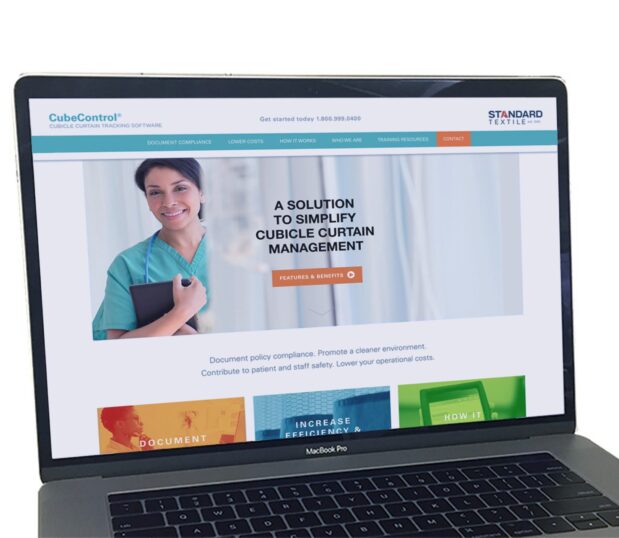 A laptop screen showing the landing page for the Cube Control website.